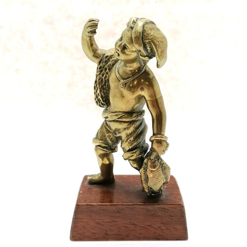 16 - Antique ormolu bronze figure of a fisher boy on a wooden base - 11cm high & lacks detail to shoulder