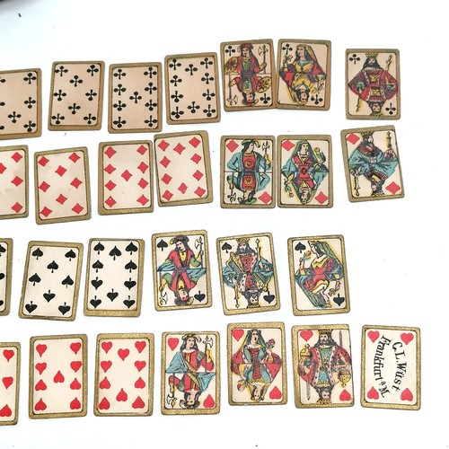 18 - Antique miniature playing cards (17mm x 12mm) 1 card missing, by C. L. Wüst, Frankfurt in an associa... 