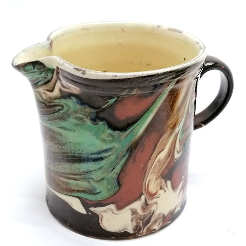 33 - 2 x Antique marble slipware jugs - largest 9.5cm & both have slight losses to interior glaze & fritt... 