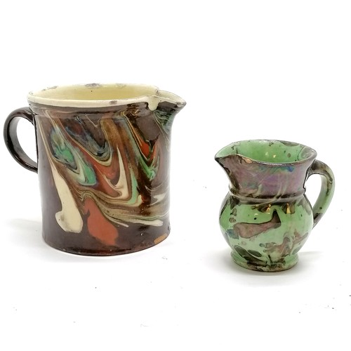 33 - 2 x Antique marble slipware jugs - largest 9.5cm & both have slight losses to interior glaze & fritt... 