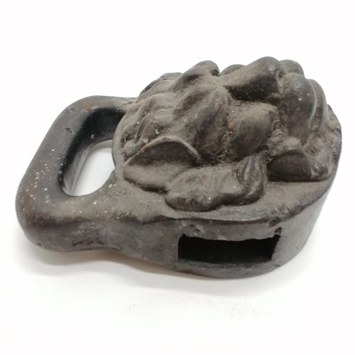 52 - 3 x antique cast iron weights - 28lb & 2 sack weights (1 with lion mask detail - 19cm high)