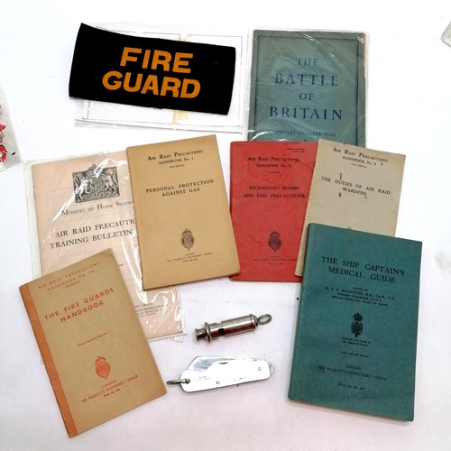 66 - Qty of WWII booklets inc air raid precautions t/w ARP wistle, fire guard armband & penknife