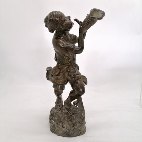 86 - Oriental bronze sculpture of a man with a conch shell with rock and wave detail to base. 29cm high