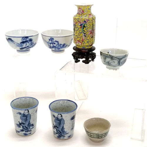 89 - Miniature Oriental yellow grounded vase on stand 7cm high T/W miniature blue and white bowls and cup... 