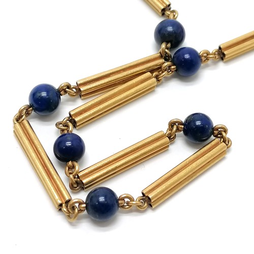 107 - Antique unmarked touch tests as high carat gold necklace with lapis lazuli beads (45cm) with detacha... 