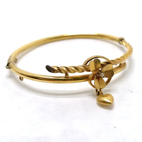 111 - Antique gilt metal bangle with 3 leaf clover / heart detail set with a pearl -  - SOLD ON BEHALF OF ... 