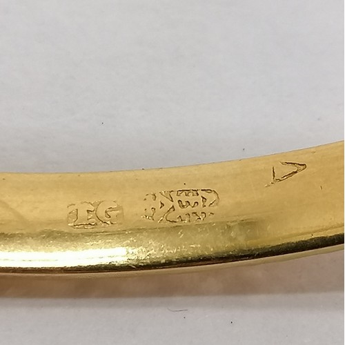 120 - Chinese gold marked high carat bangle decorated with 2 bells, screw down safety catch approx. 6cm di... 