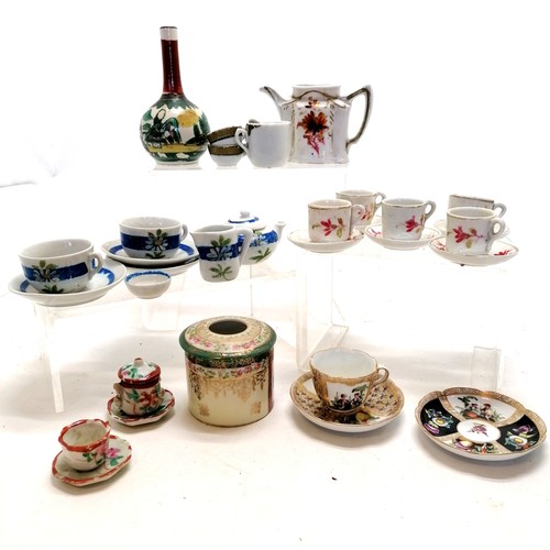 100 - Miniature Rosenthal cup and saucer 4cm high, in good condition T/W a quantity of dolls cups and sauc... 