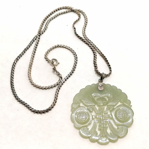 202 - Hand carved Chinese jade pendant / panel (5.5cm diameter) on a long 68cm silver chain