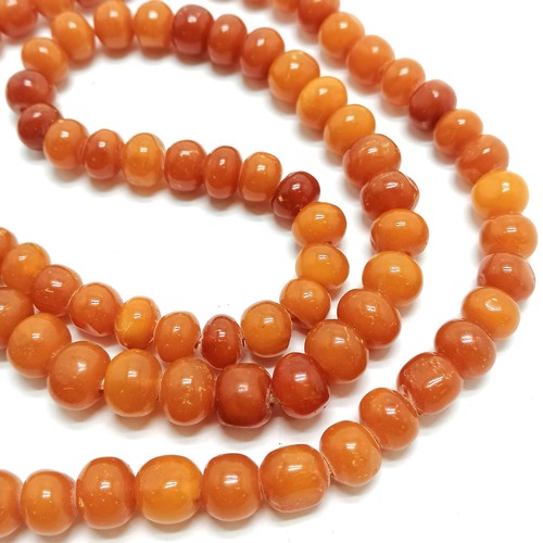 230 - Antique strand of amber beads - 64cm & total weight 33g (beads are approx 9mm diameter) - SOLD ON BE... 