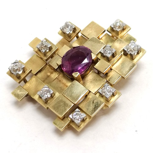 239 - Unmarked gold (touch tests as 18ct) brutalist pendant set with 9 diamonds & pink sapphire inscribed ... 