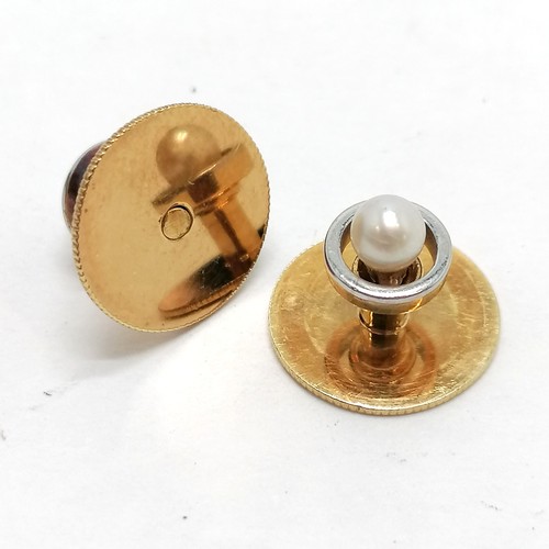 242 - Pair of unmarked (touch tests as high carat) gold & pearl set shirt studs (3.5g total weight) in an ... 