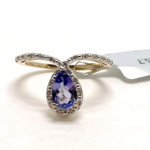 246 - 9ct hallmarked gold tanzanite & white stone ring - size N½ & 2.7g total weight - in unworn condition