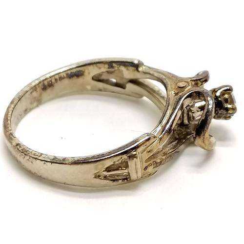 248 - 9ct hallmarked gold ring with a 'swinging from side to side' diamond - size M½ & 3.5g total weight