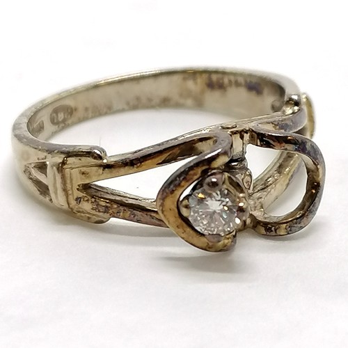 248 - 9ct hallmarked gold ring with a 'swinging from side to side' diamond - size M½ & 3.5g total weight