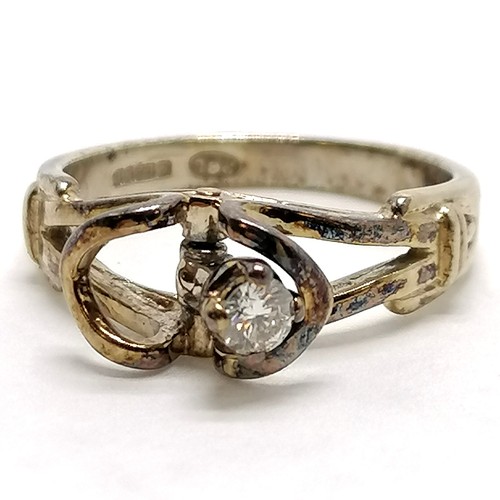 248 - 9ct hallmarked gold ring with a 'swinging from side to side' diamond - size M½ & 3.5g total weight