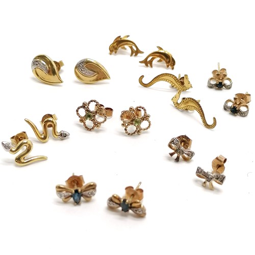 253 - 8 x pairs of 9ct gold earrings inc seahorses, dolphins, snake etc - some are stone set inc diamonds ... 