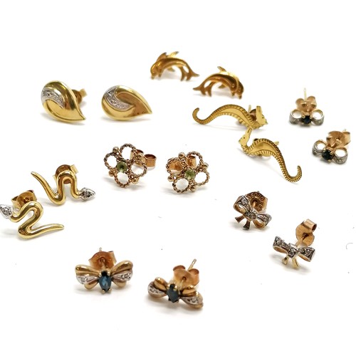 253 - 8 x pairs of 9ct gold earrings inc seahorses, dolphins, snake etc - some are stone set inc diamonds ... 