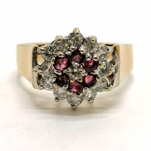 261 - 9ct hallmarked gold red & white stone cluster ring - size Q½ & 3.5g total weight ~ slight a/f