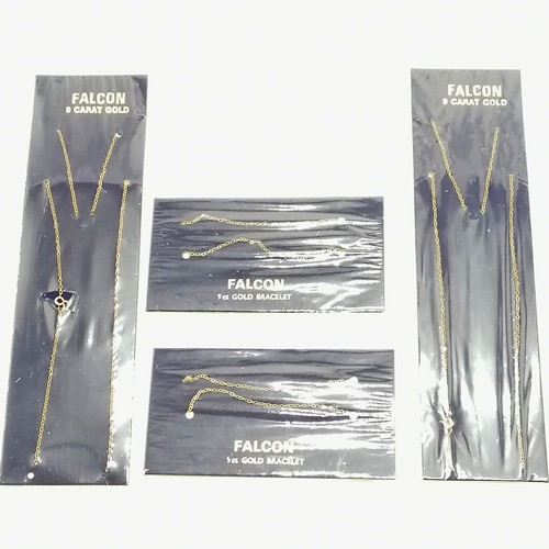 269 - 2 x 9ct gold bracelets + 2 x 9ct gold necklaces on original cards with cellophane wrapping