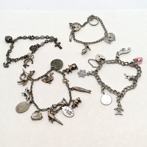 277 - 4 x silver charm bracelets inc Thomas L Mott st christopher,  pig, clown etc - total weight 60g