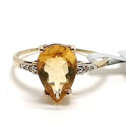 292 - 9ct hallmarked gold pear shaped citrine / diamond set ring - size S & 2.1g total weight ~ in unworn ... 