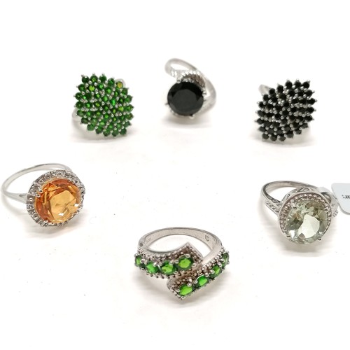 317 - 6 x silver marked rings inc green stone cluster ring - total weight 30g