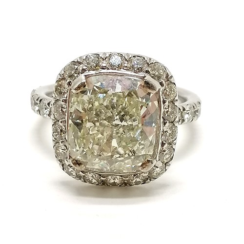 326 - Impressive large 4.55ct centre stone cushion shaped diamond ring with 18 diamonds surrounding the ce... 