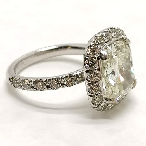 326 - Impressive large 4.55ct centre stone cushion shaped diamond ring with 18 diamonds surrounding the ce... 