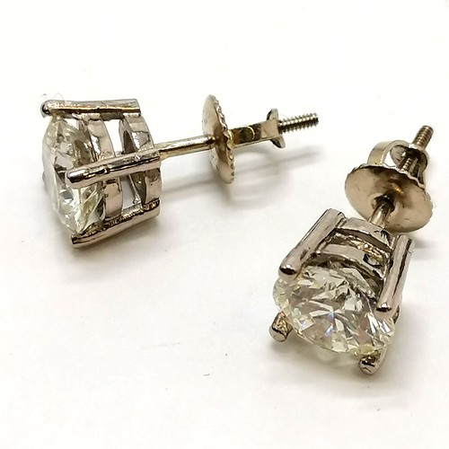 327 - Large pair of diamond stud earrings in 18ct white gold with screw on backs - 7.2mm diameter & 3.02ct... 