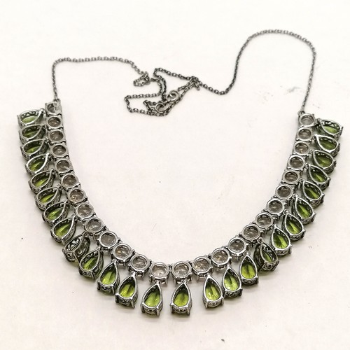 338 - Silver marked green pear shaped & white stone set necklet - 48cm long & 33g total weight