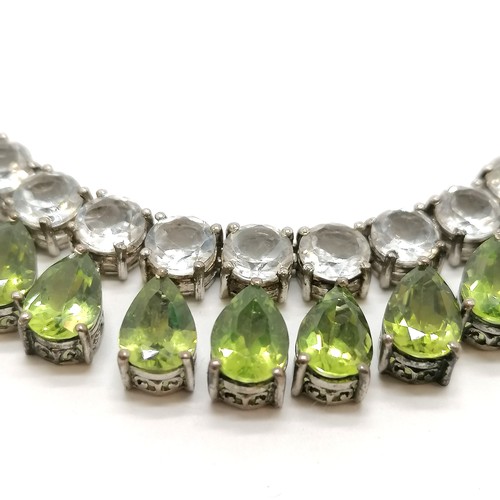 338 - Silver marked green pear shaped & white stone set necklet - 48cm long & 33g total weight