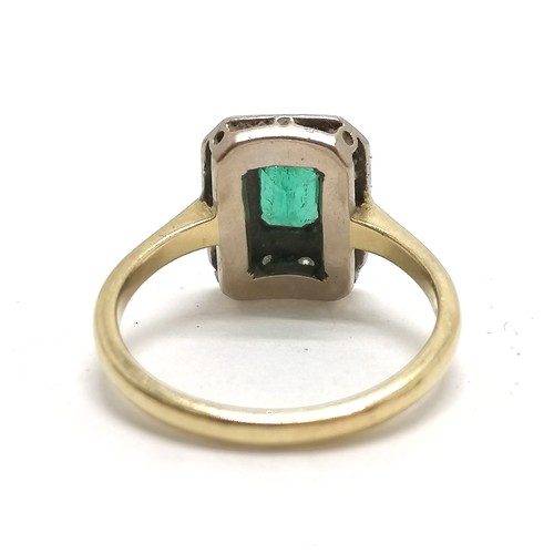 351 - 18ct hallmarked gold emerald & diamond cluster ring - size O & 4.2g total weight