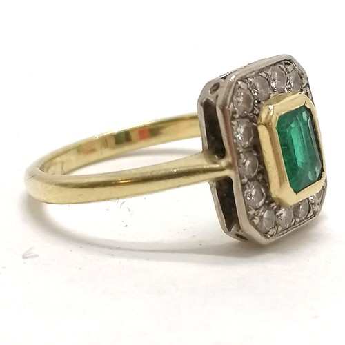 351 - 18ct hallmarked gold emerald & diamond cluster ring - size O & 4.2g total weight