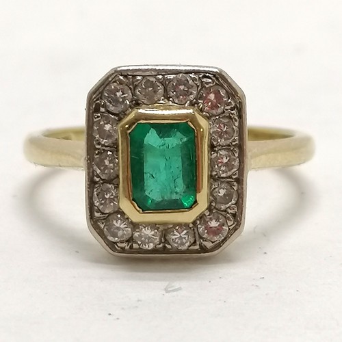 351 - 18ct hallmarked gold emerald & diamond cluster ring - size O & 4.2g total weight