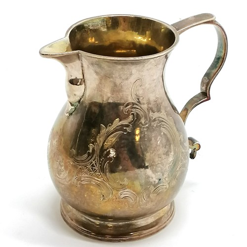 388 - Antique silver cream jug with engraved decoration and sparrow beak spout and lemon gilt interior - 8... 