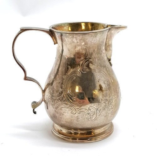 388 - Antique silver cream jug with engraved decoration and sparrow beak spout and lemon gilt interior - 8... 