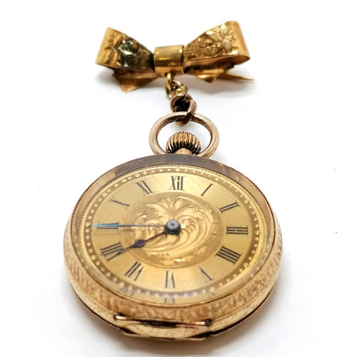 401 - Antique 14ct marked gold outer cased ladies fob watch - 3cm diameter with 9ct marked gold bow suspen... 