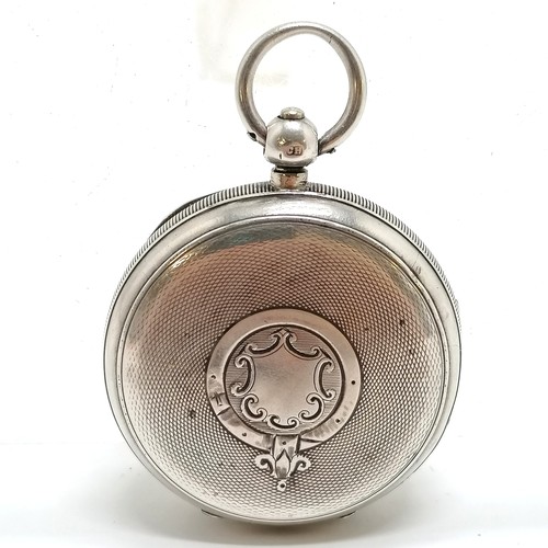 416 - Antique silver cased pocket watch (5cm diameter) with gold arabic numerals to the silvered dial - pa... 