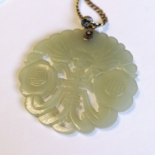 202 - Hand carved Chinese jade pendant / panel (5.5cm diameter) on a long 68cm silver chain