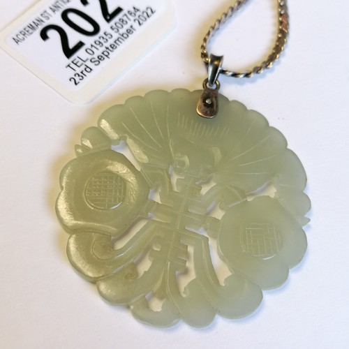 202 - Hand carved Chinese jade pendant / panel (5.5cm diameter) on a long 68cm silver chain