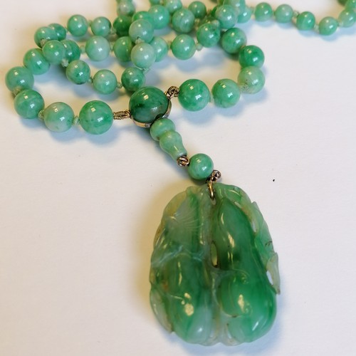 234 - Antique Chinese spinach jade bead (largest bead 10mm in diameter) necklace with a hand carved pendan... 