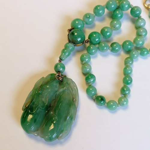 234 - Antique Chinese spinach jade bead (largest bead 10mm in diameter) necklace with a hand carved pendan... 