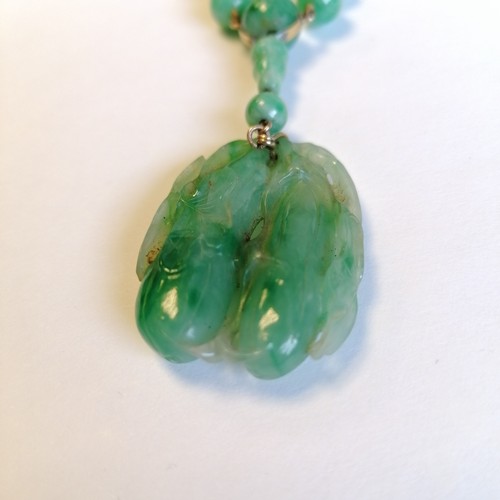 234 - Antique Chinese spinach jade bead (largest bead 10mm in diameter) necklace with a hand carved pendan... 