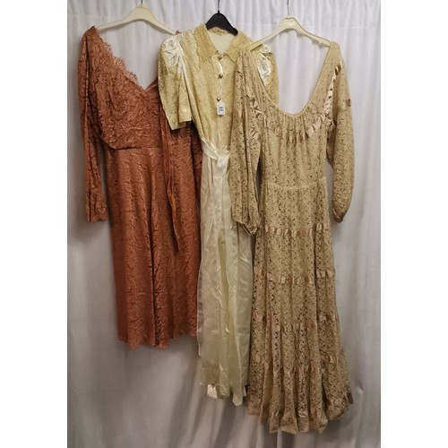 65 - 3 1950s evening dresses. Coral lace dress with belt in good condition, chest 82cm. Beige lace tiered... 