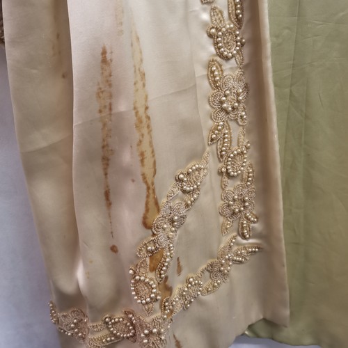 68 - 1930s silk coat with bead work to front, has several stains across front and on sleeves.