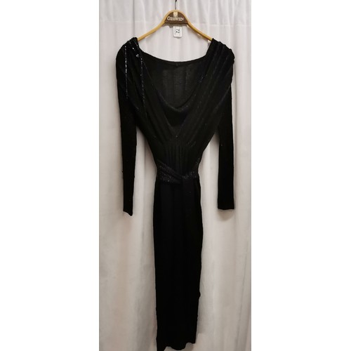 72 - 1980s black knitted dress with bead work to shoulder, chest 82cm.