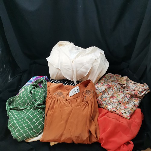 98 - Job lot of blouses will include silk blouses.