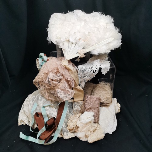 111 - Box of a feather fan, lace collars and job lots of lace, fan is a little worn and lace is in good us... 