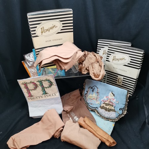 114 - Box of various stockings including 'Penguin' and 'Pretty Polly' some include war time stockings, all... 